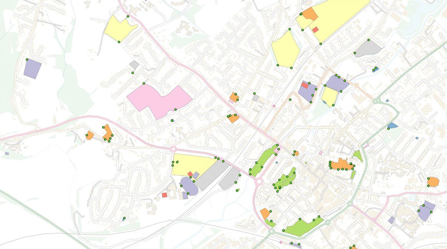 Example map showing OS Open Greenspace polygons and access points overlaid on an OS OpenMap – Local basemap. The polygons depict areas of greenspace while the points depict access points into the greenspace areas.