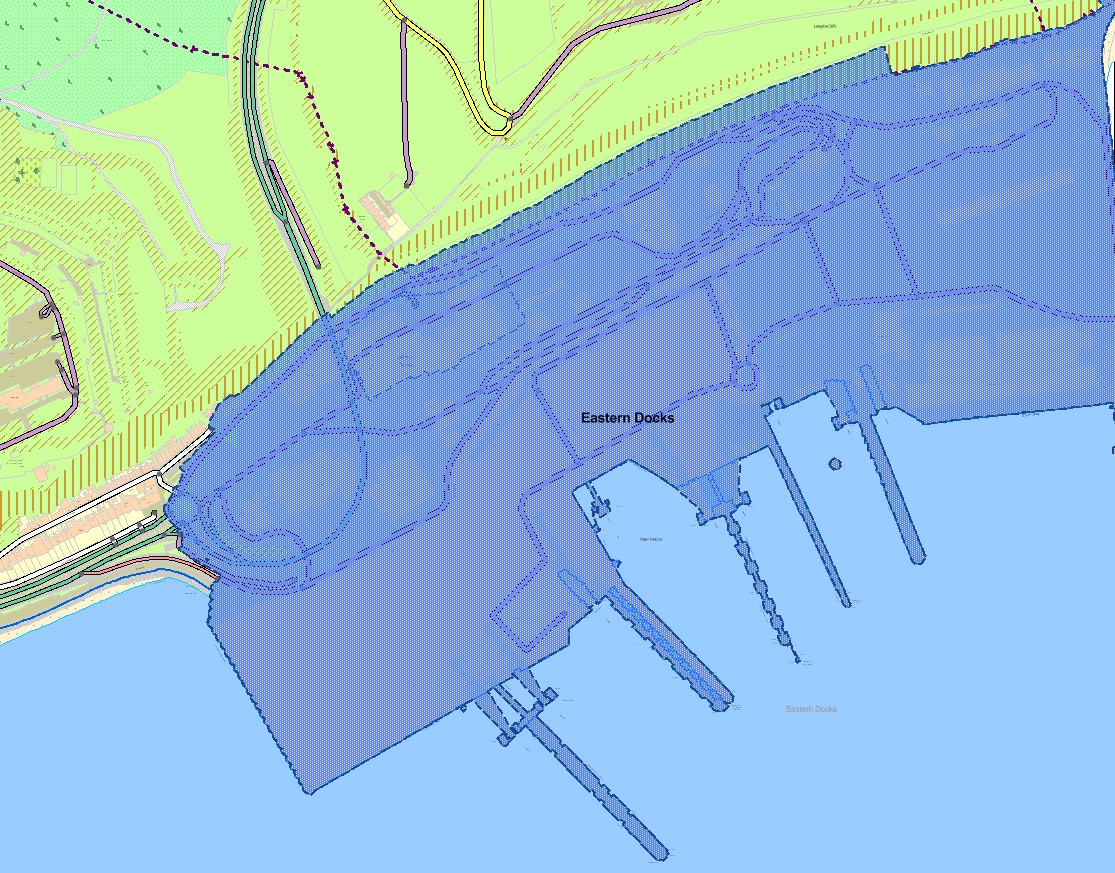OS MasterMap Sites Layer (blue polygon) Water transport theme, showing a blue polygon over a port consisting of docks and nautical berthing.