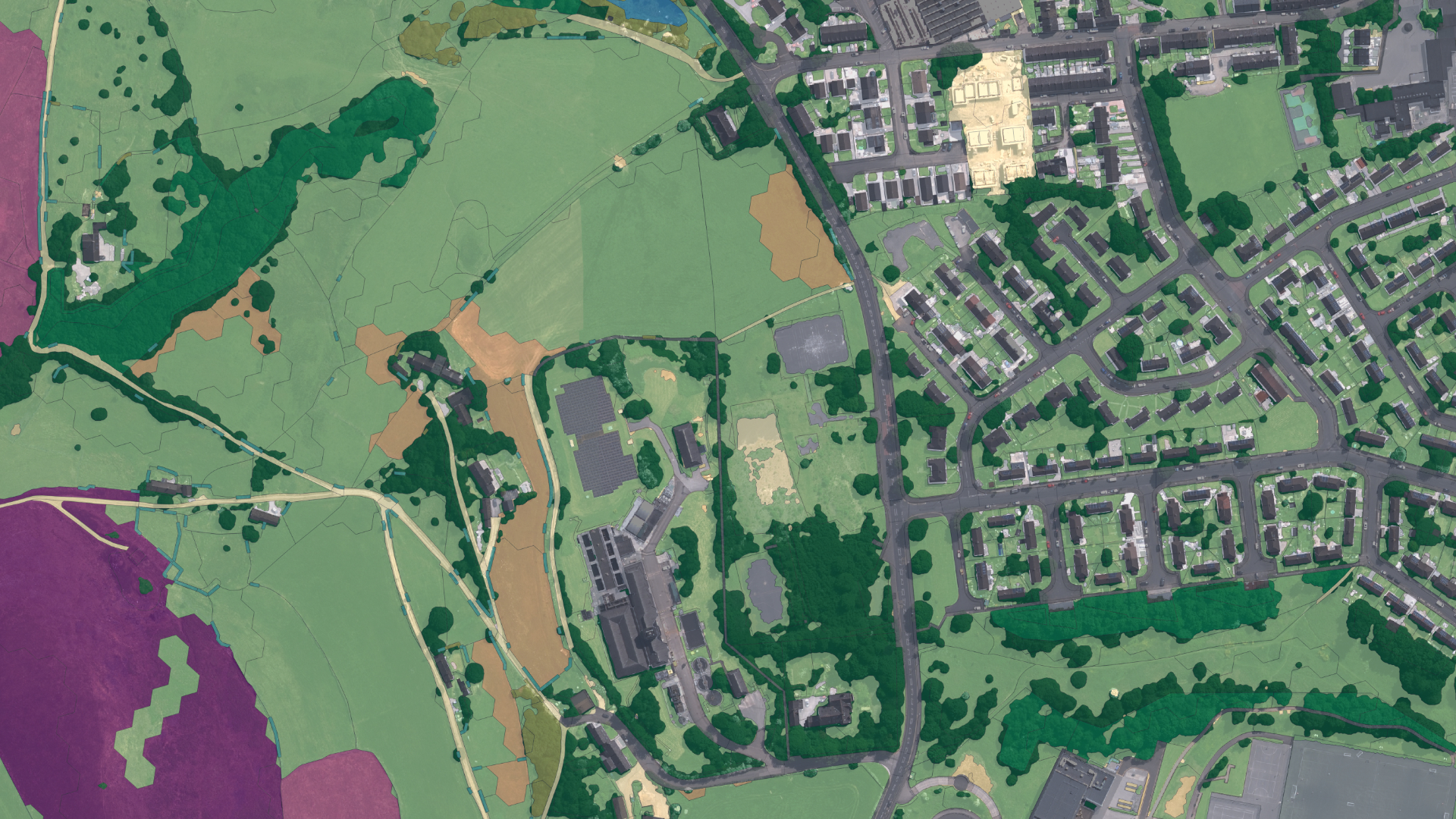 OS Enhanced Land Cover Beta image showing residential areas and green spaces from an aerial view.