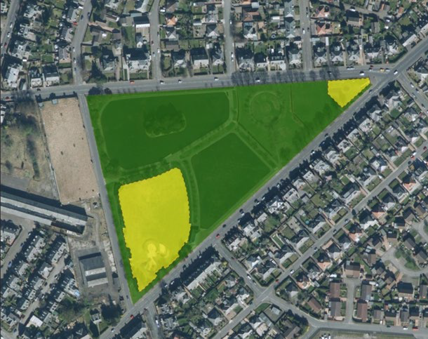 Satellite image of a greenspace site with nested sites. Two play areas (yellow polygons) exist within a larger greenspace park (green polygon).