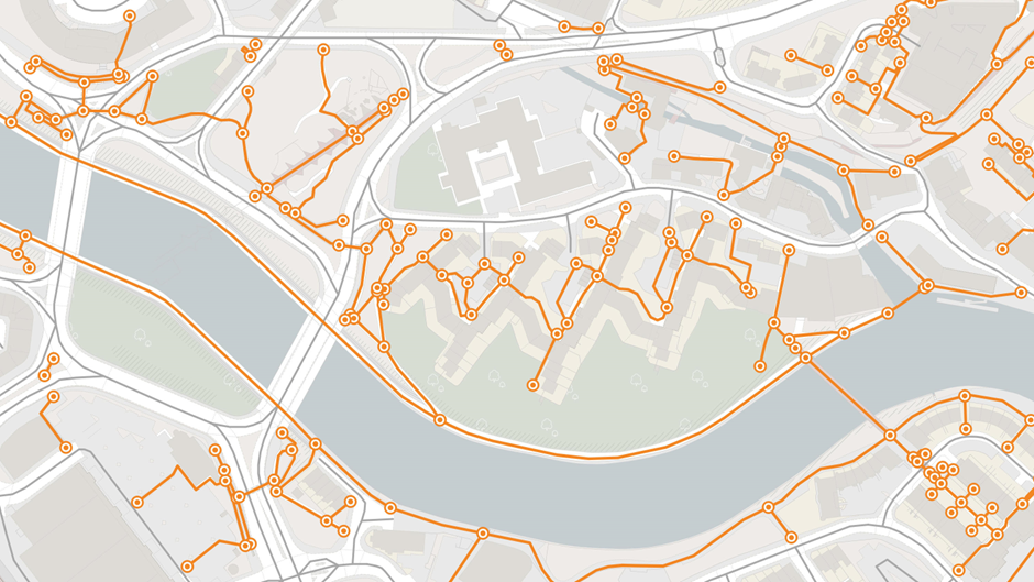 OS MasterMap Highways Network - Paths data showing footpaths around a river on a map
