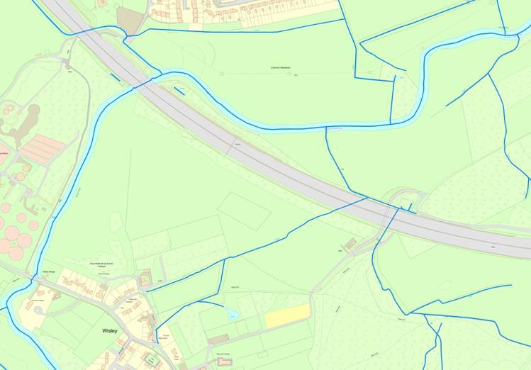 An example map showing the WatercourseLink feature which  represents the alignment of watercourses. All watercourses on the map extract have a blue solid line on top of them to show their alignment - theWatercourseLink feature.